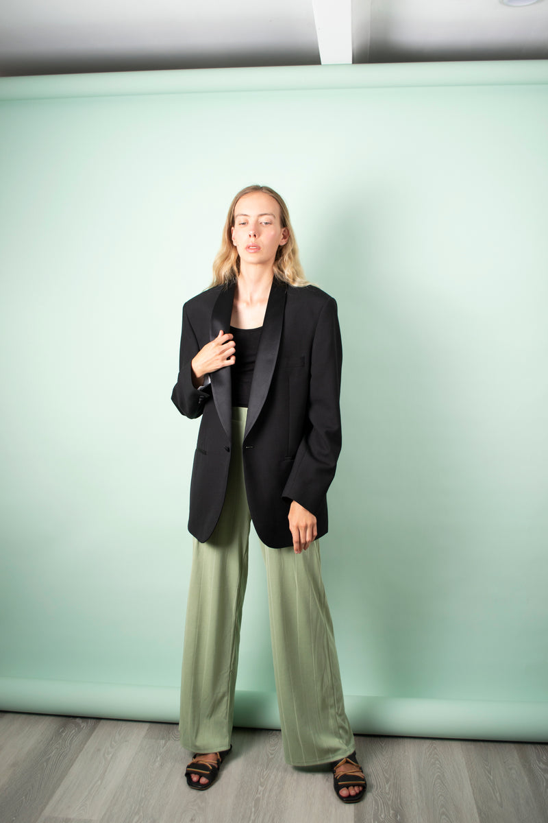 black men unisex blazer worn with mint pants and sandals